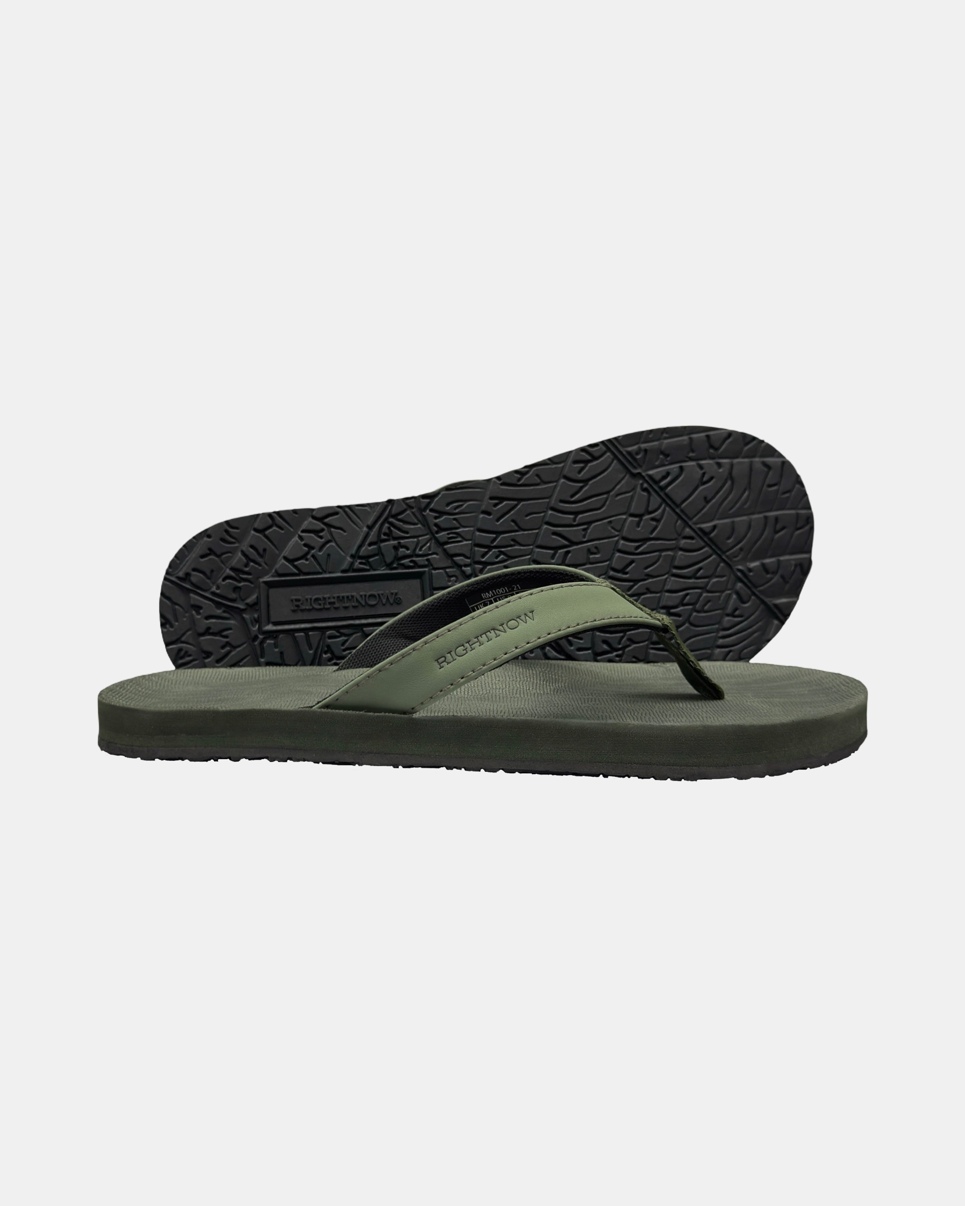 Men's forest-tone minimalist thong sandal with V-shaped strap and an open-toe design, with the black rubber textured anti-slip sole behind it.