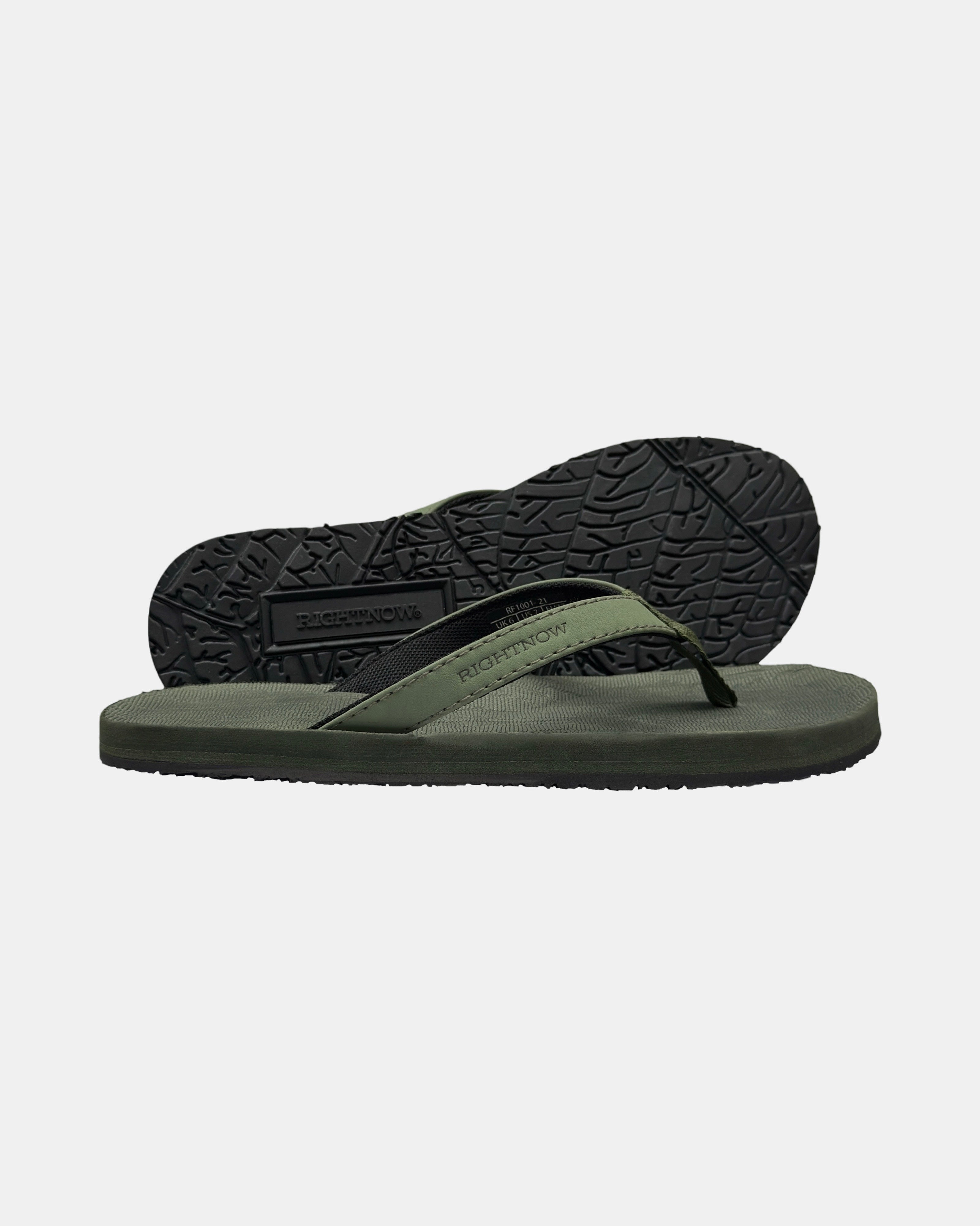 Women's forest-tone minimalist thong sandal with V-shaped strap and an open-toe design, with the black rubber textured anti-slip sole behind it.