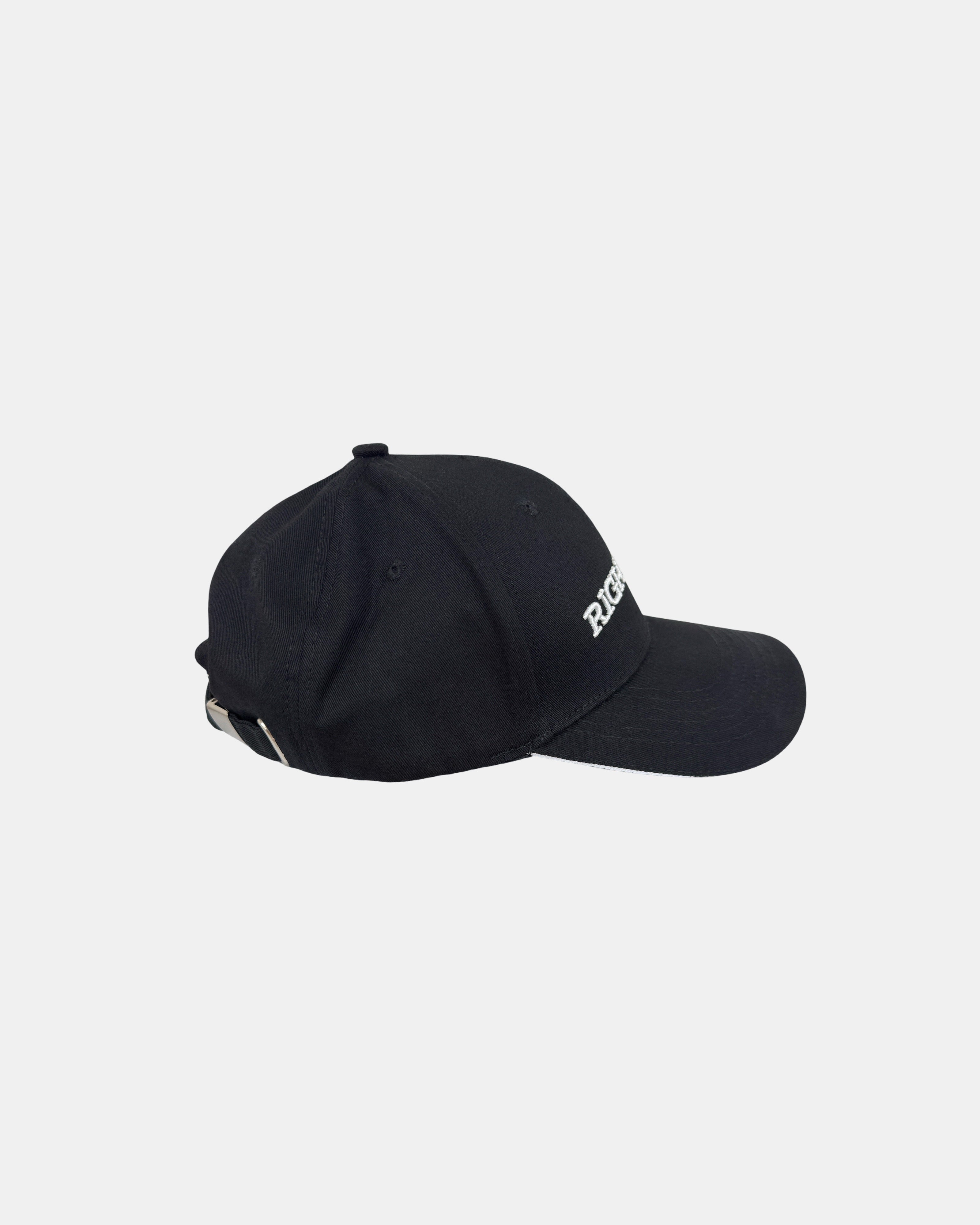 Right side profile of a matt black RIGHTNOW logo baseball cap, highlighting its minimalist design and breathable cotton twill fabric.