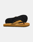 Men's earth-tone minimalist thong sandal with V-shaped strap and an open-toe design, with the black rubber textured anti-slip sole behind it.
