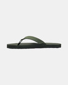 Men's natural green rubber Thong-style sandal seen from the left side, highlighting the contoured and grooved topsole with embedded arch support.