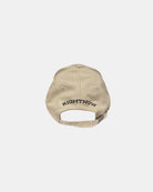 Back view of the sand beige Ignite cotton cap, showing the full ‘RIGHTNOW’ brand logo embroidery and the minimalist adjustable metal buckle.