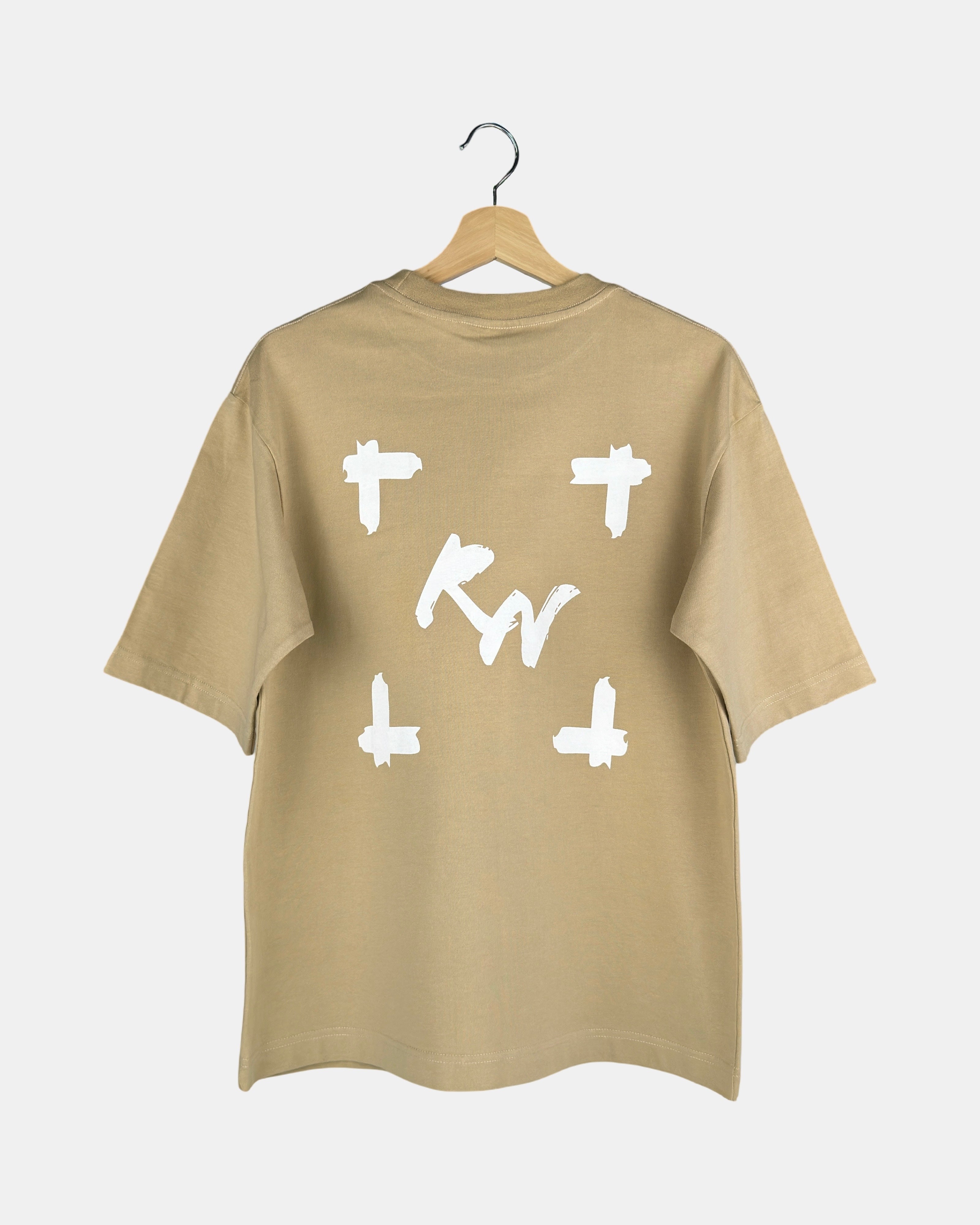 Back view of a unisex sand beige Moment oversized t-shirt in premium cotton, showing a large canvas-style graphic with a deep, expansive, and line-less design.