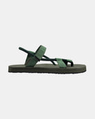 Women's natural green rubber Roman sandal seen from the right side, with Rottan-like adjustable strap on the ankle.